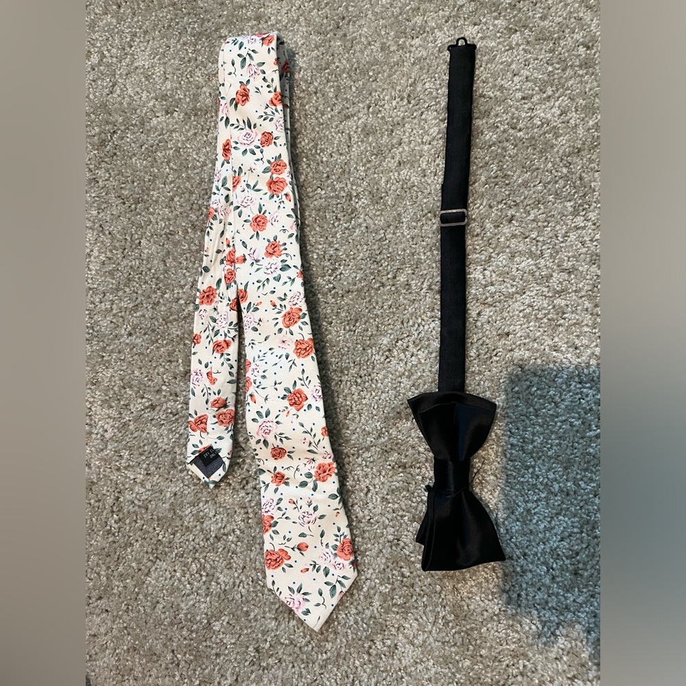 Men’s black bow tie and floral neck tie